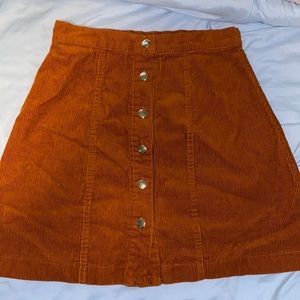 Orange button up corduroy skirt